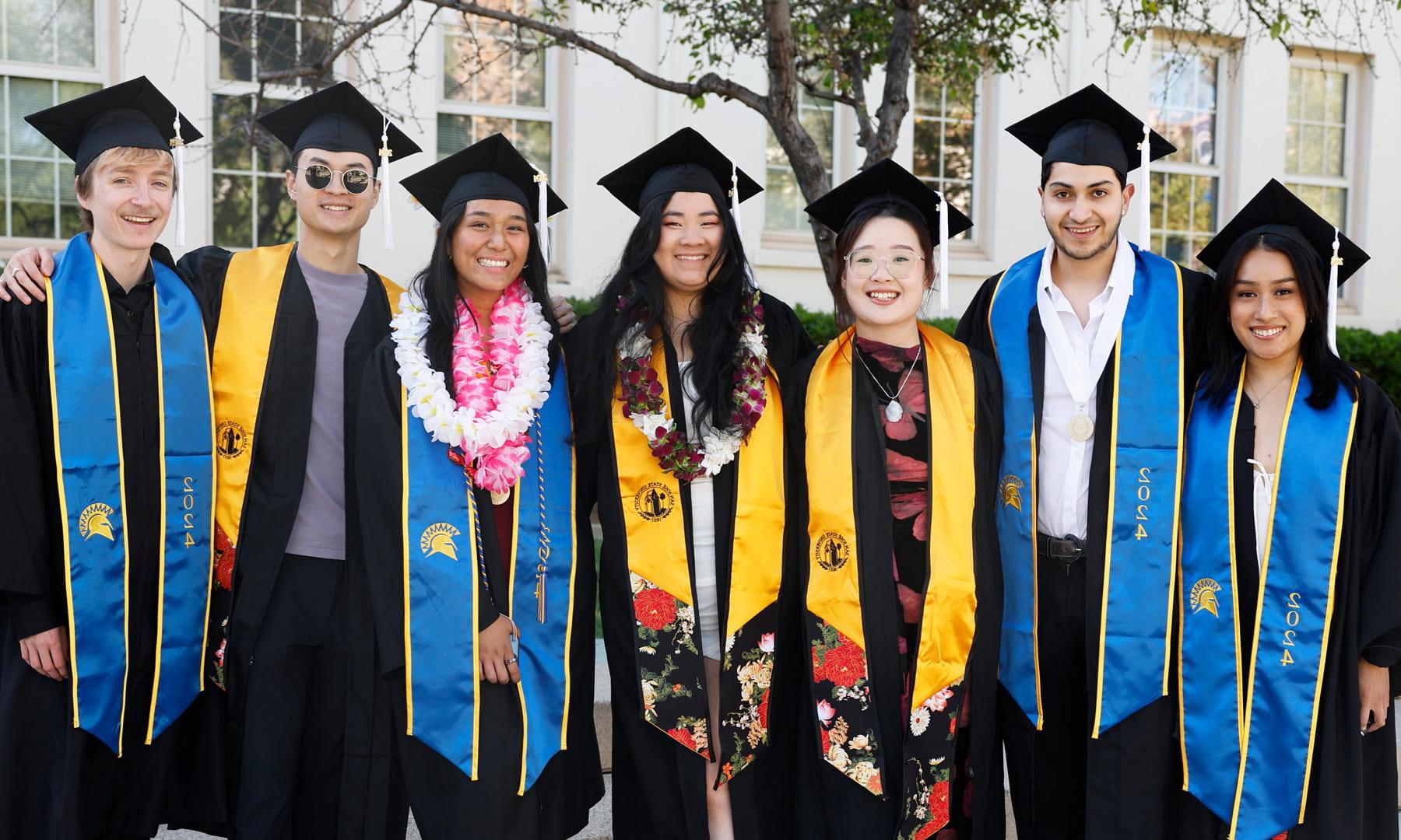 A diverse group of 7 菠菜网lol正规平台 Graduates